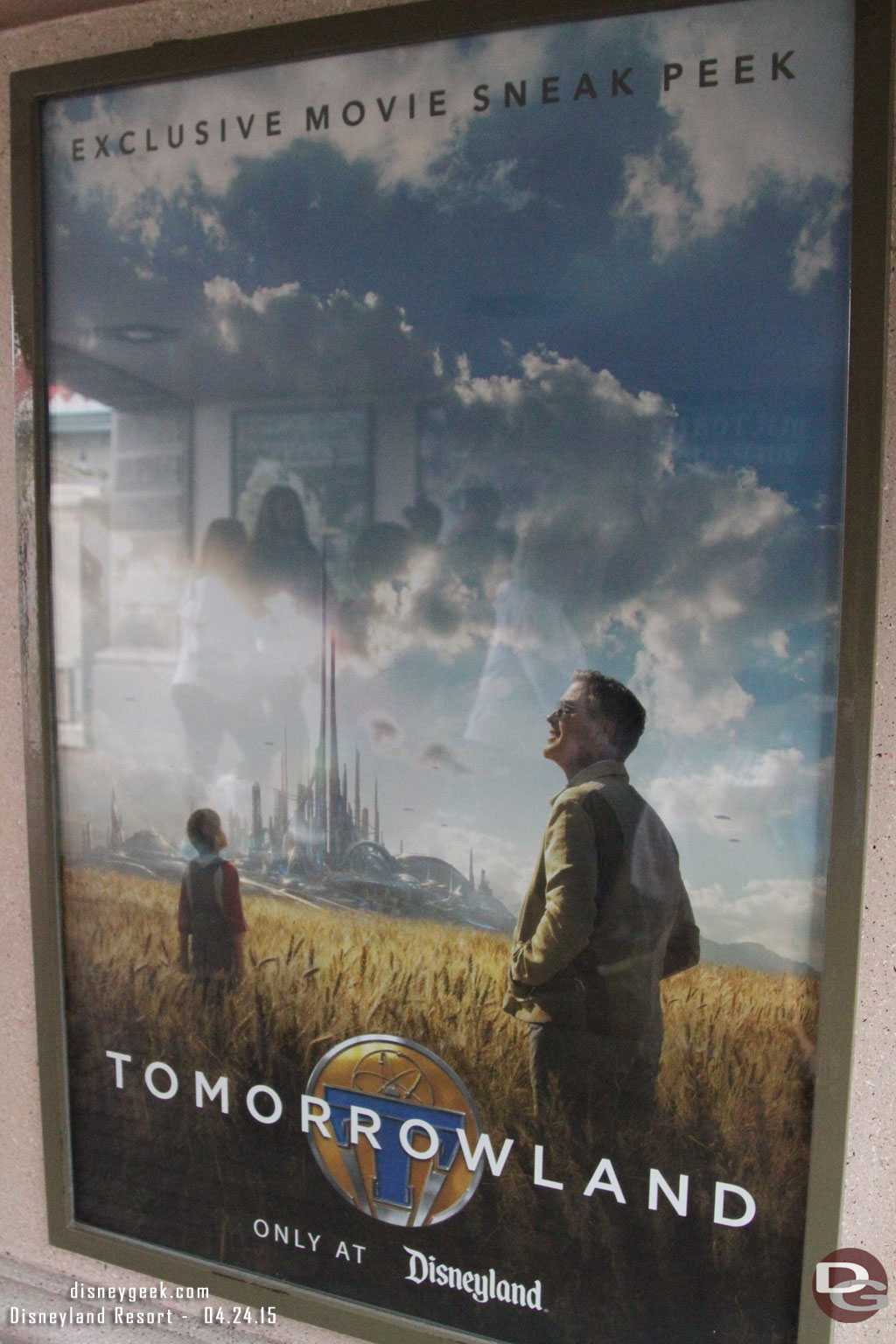 A Tomorrowland movie sneak peek poster as you enter the park.