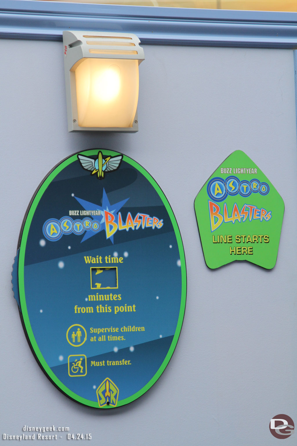 A temporary wait time sign on the wall.  The attraction was just reopening when I walked by.