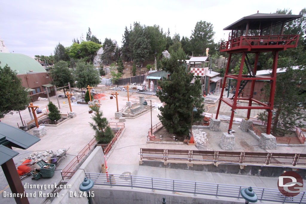 Most of the concrete in front of Soarin and the planters are in.  A large watch tower has replaced the steel structure that used to be there.