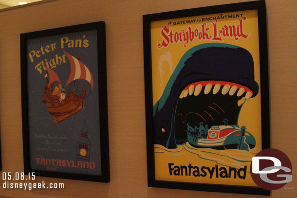 Attraction posters near the restrooms.