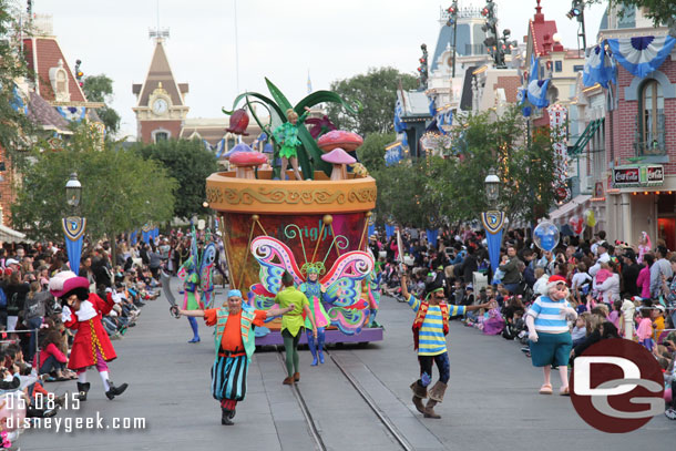 Waiting to cross Soundsational.  A look down Main Street at the Peter Pan group is approaching.