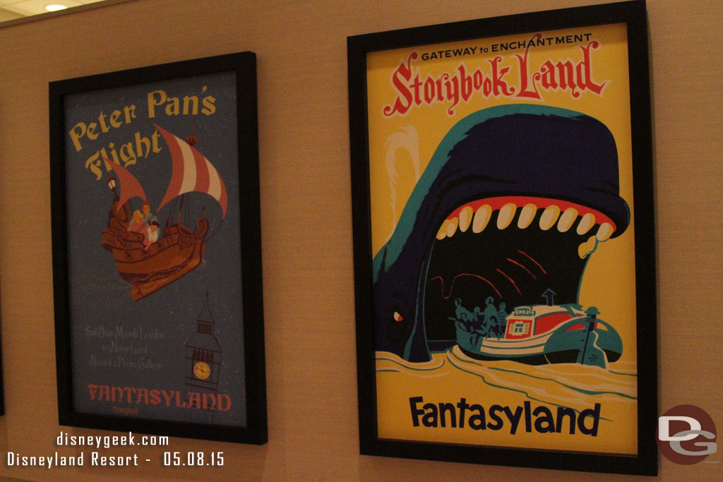 Attraction posters near the restrooms.