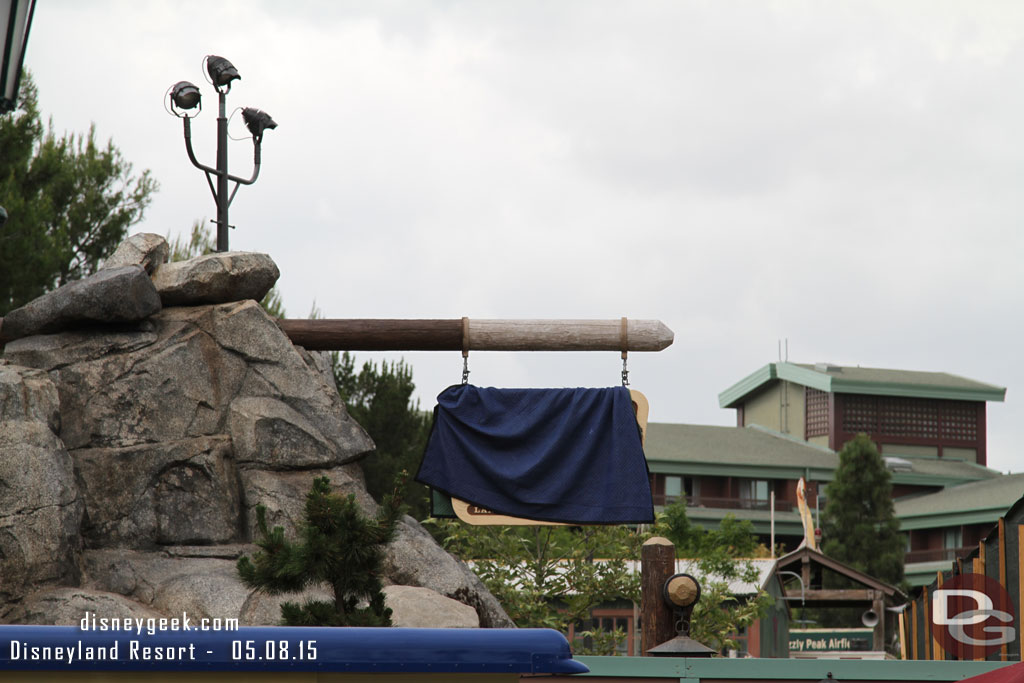 The sign for Grizzly Peak Airfield is installed but covered.