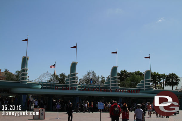 A look at the Disney California Adventure entrance.  The Diamond Anniversary decorations are partially installed.  The left and center are up but not the right one yet over the letters.