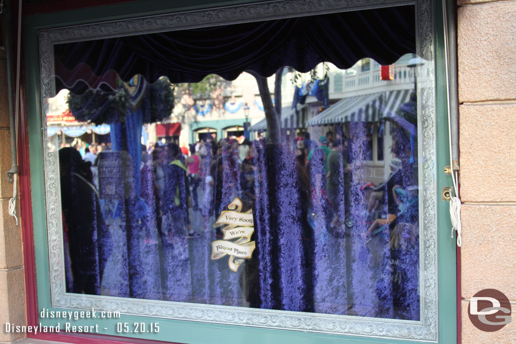 Outside the Emporium Windows still have curtains up.