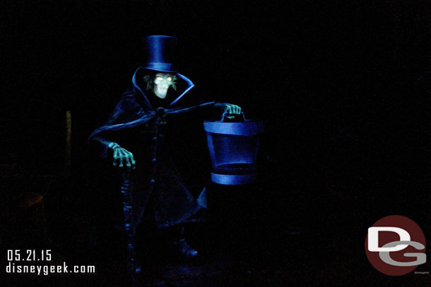 The Hatbox Ghost has rematerialized inside the Haunted Mansion.  He is as you exit the attic right before descending to the graveyard.  
Here is my first attempt at capturing the Hatbox Ghost.