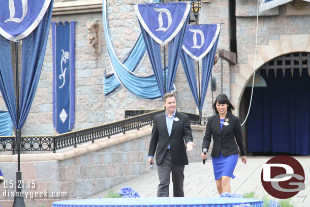 Disneyland Resort President Michael Colglazier and a Disneyland Ambassador take the stage.