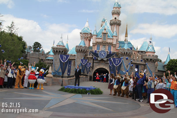 The cast throws their hats in the air.