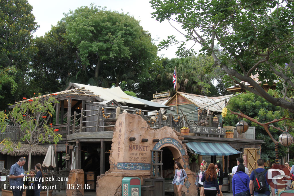 The roof of Tropical Imports looks to be done.  From down here you cannot really see any changes.