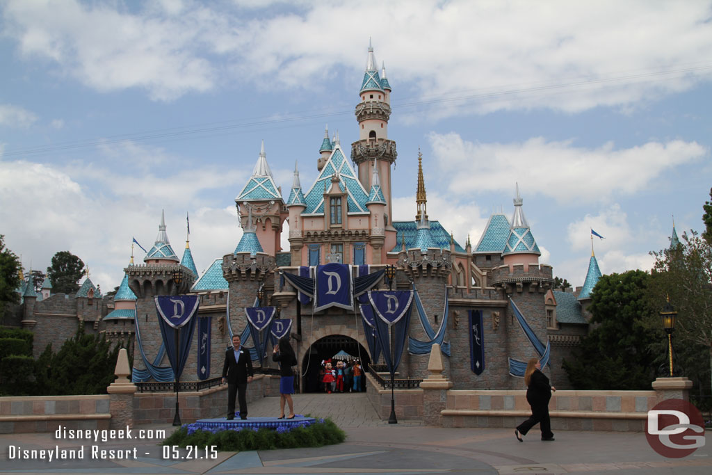 Characters and representatives of the cast stream out from the castle