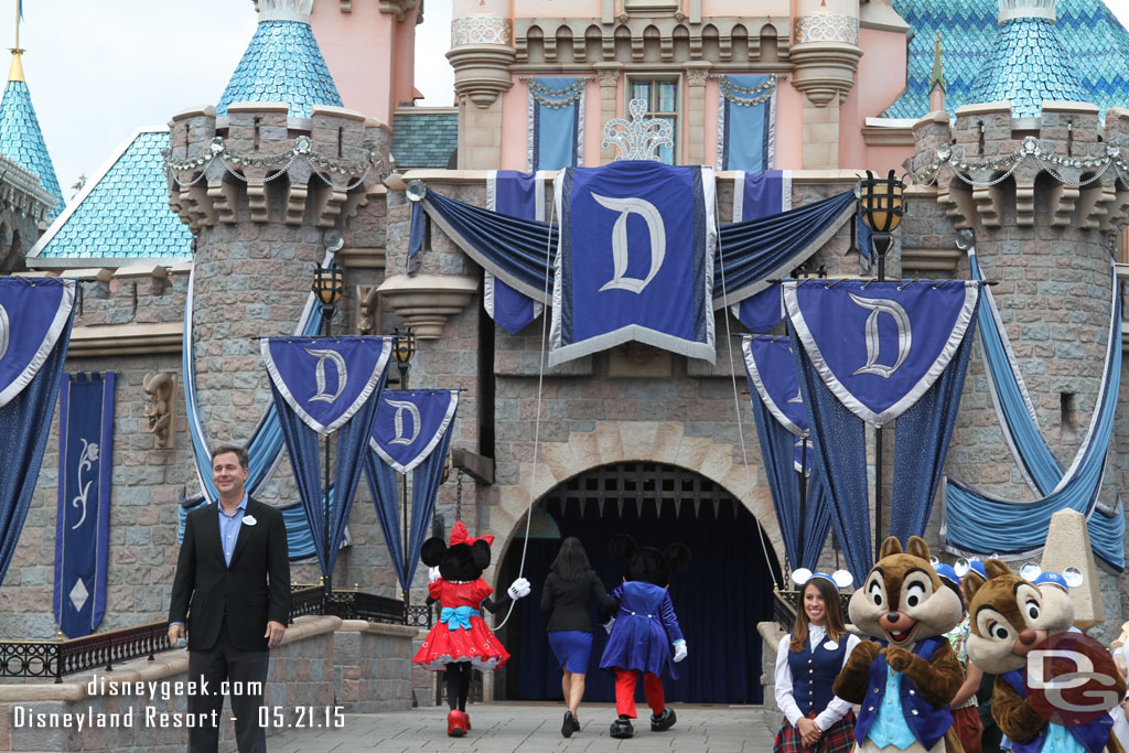 Mickey, Minnie, and the Ambassador head back to unveil the final element.