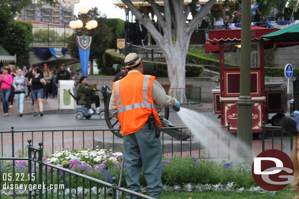 Found this interesting.. a cast member was out doing some gardening.  Guess around their regular time.. just this morning the park was opening.