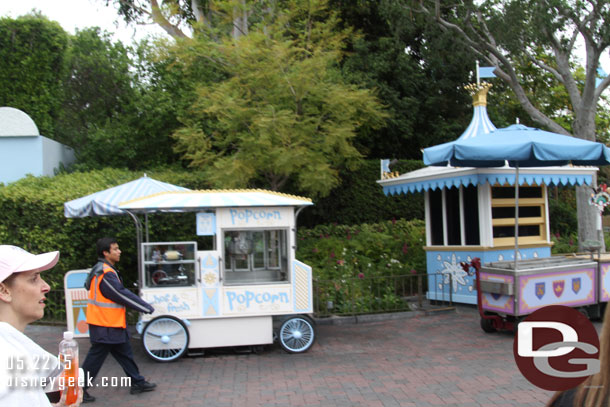 The Fantasyland Popcorn cart was not open yet.  Later in the day walked by and the line for this one stretched about 2/3 the way back to Storybook, they had the Cinderella Coach buckets.