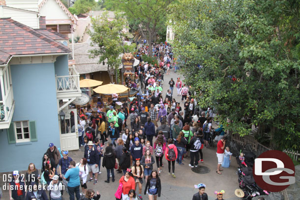 A look down at Adventureland.  On the left the line for River Belle.  You can see one that wrapped from the other side going down the middle, and then follow the one from the door on the left and it goes back toward the Oasis in the distance.