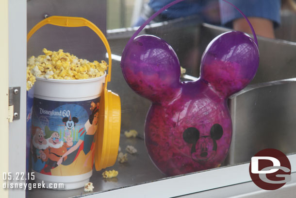 Purple balloon popcorn buckets out near the Fun Wheel.