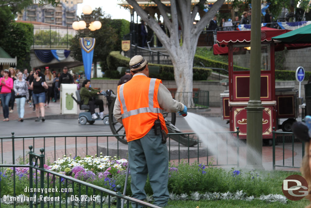 Found this interesting.. a cast member was out doing some gardening.  Guess around their regular time.. just this morning the park was opening.