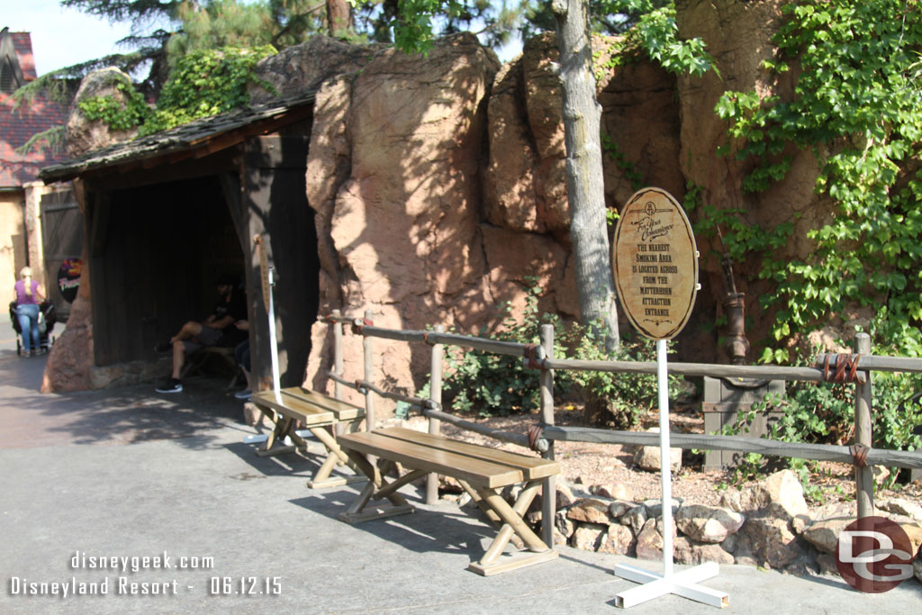 The smoking area has been closed along the trail.  So if you want to smoke you are limited to the one in Fantasyland near Matterhorn or the one along the Rivers of America, but that one closes early for Fantasmic.  So the park is getting closer to being smoke free.