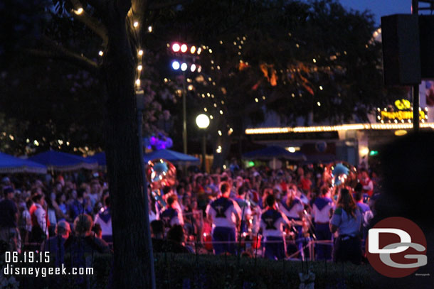 The band stops at the head of Main Street in the hub and performs.