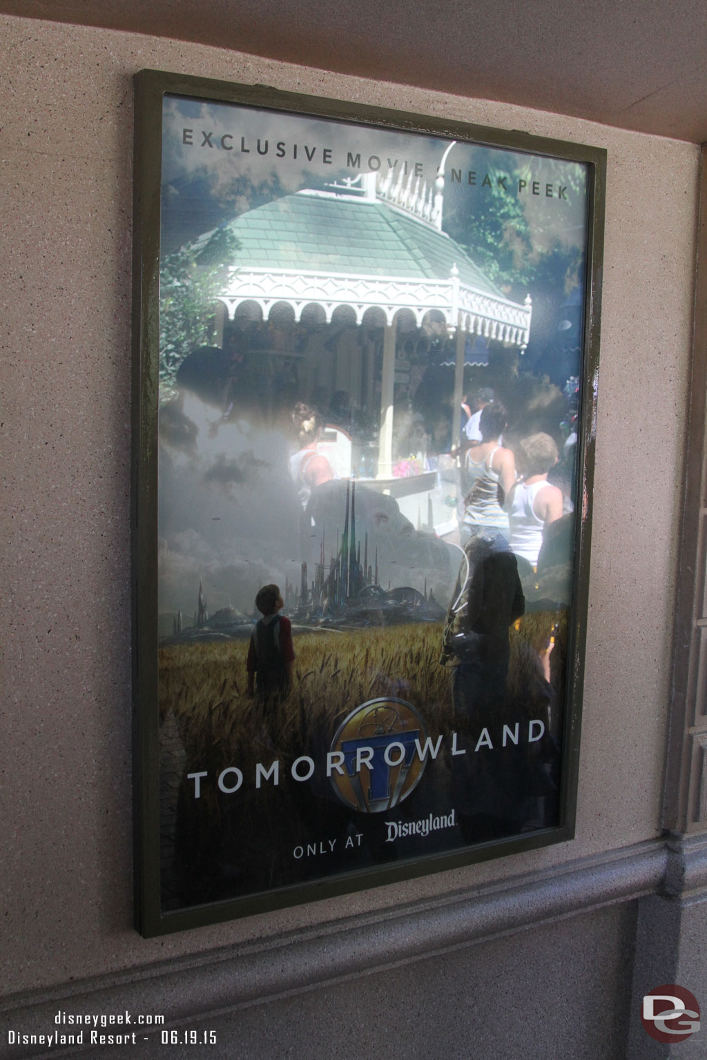 The Tomorrowland movie poster is still up as you enter the park.