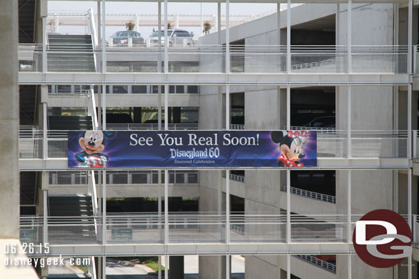 The Mickey and Friends 60th Anniversary exit banner.