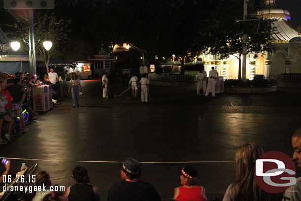 Custodial cast members were cleaning up the area after the parade guests were moved back.