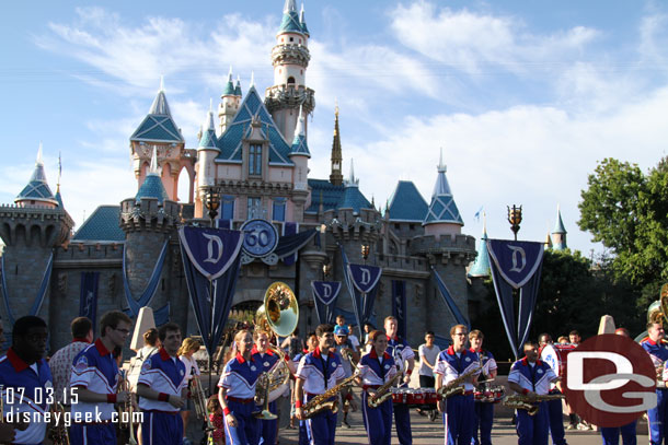 The All-American College Band performing in front of Sleeping Beauty Castle