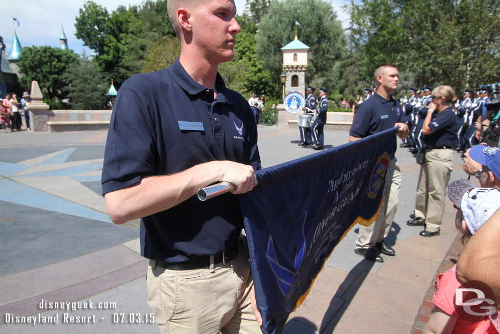 I thought this was odd staging.  The two holding the banner stood right at show center the entire time blocking the view and so close to guests you could not get a picture of it really.