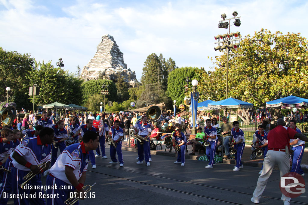 The Band stopping to perform an Incredibles number at the top of Main Street USA