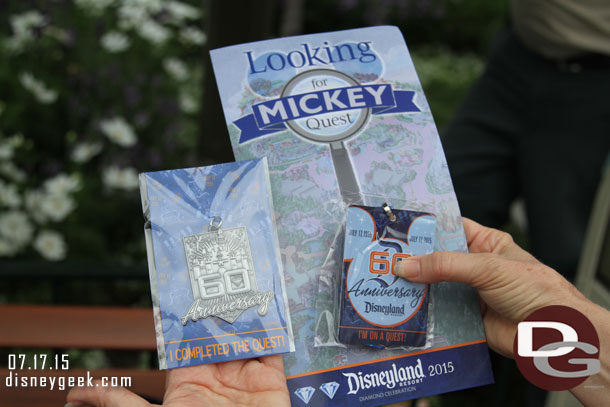 A new Mickey Quest game debuted yesterday.  Here is a picture of the map, lanyard, and prize for completion.  They were distributing all three when you purchased it to avoid redemption lines later.