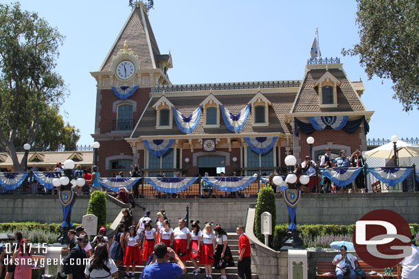 Found a spot for the Disneyland Bands 11:30am Town Square set.  A group of guests in Mouseketeer outfits on the steps.