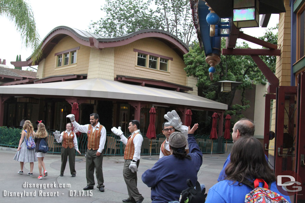 More cast members along the walkway.