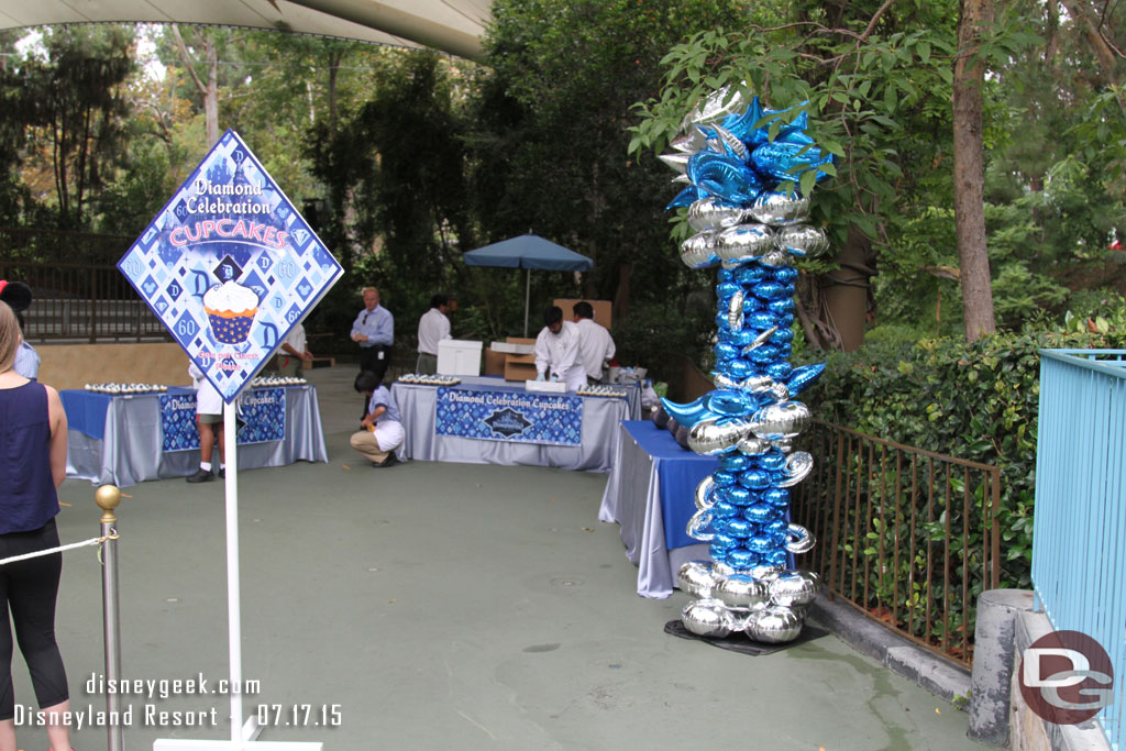 Cast Members preparing to start handing them out.