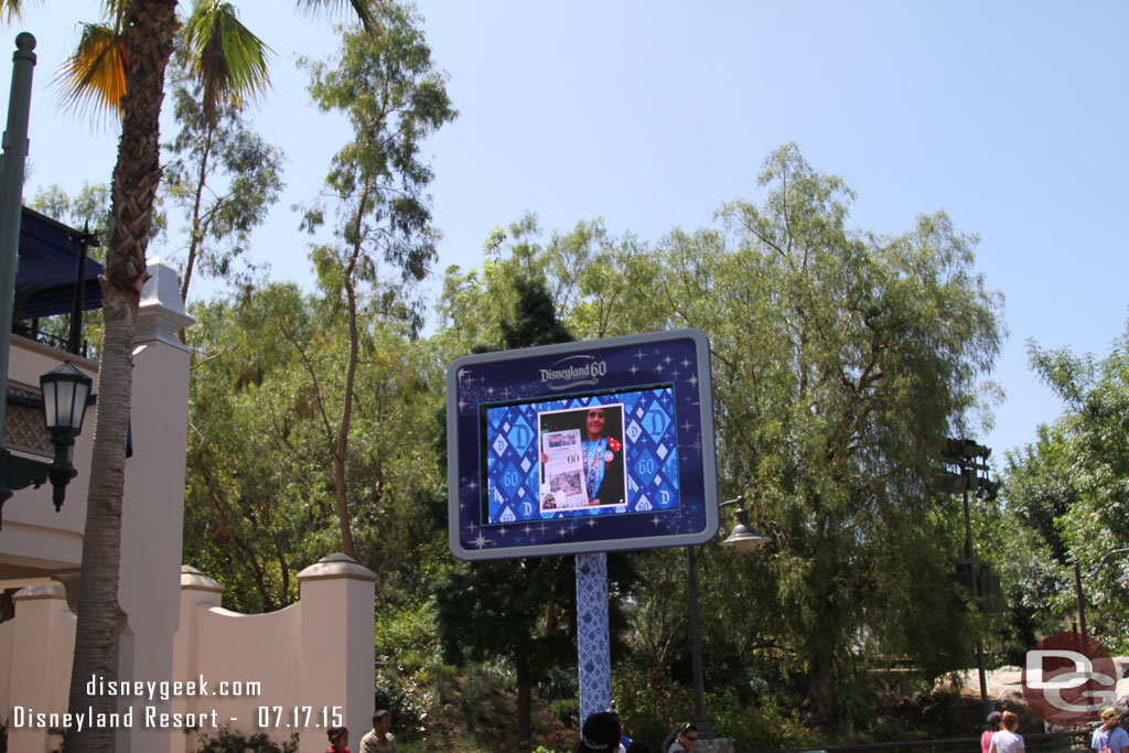 An LCD screen that broadcasted the ceremony and now is showing guest tweets.