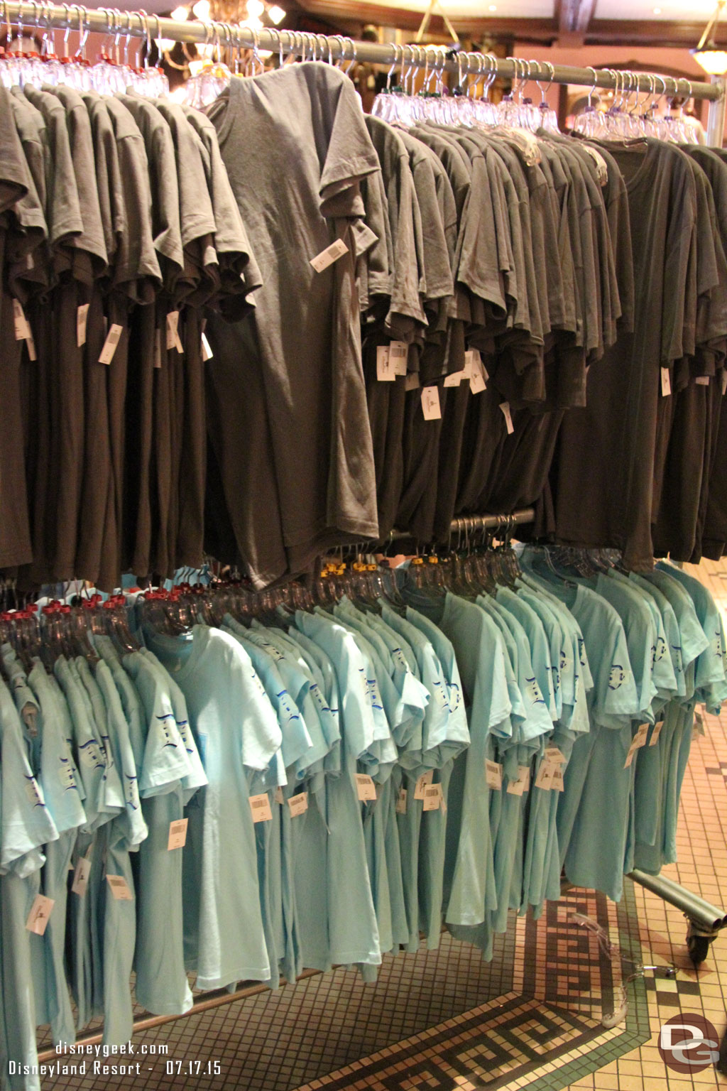 Walking through the Emporium shirts on a standard rack in the middle of the store.