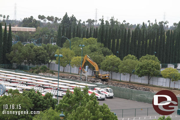 They are removing asphalt and some trees.  My understanding is some support facilities will be relocated here from backstage as part of the Star Wars project.