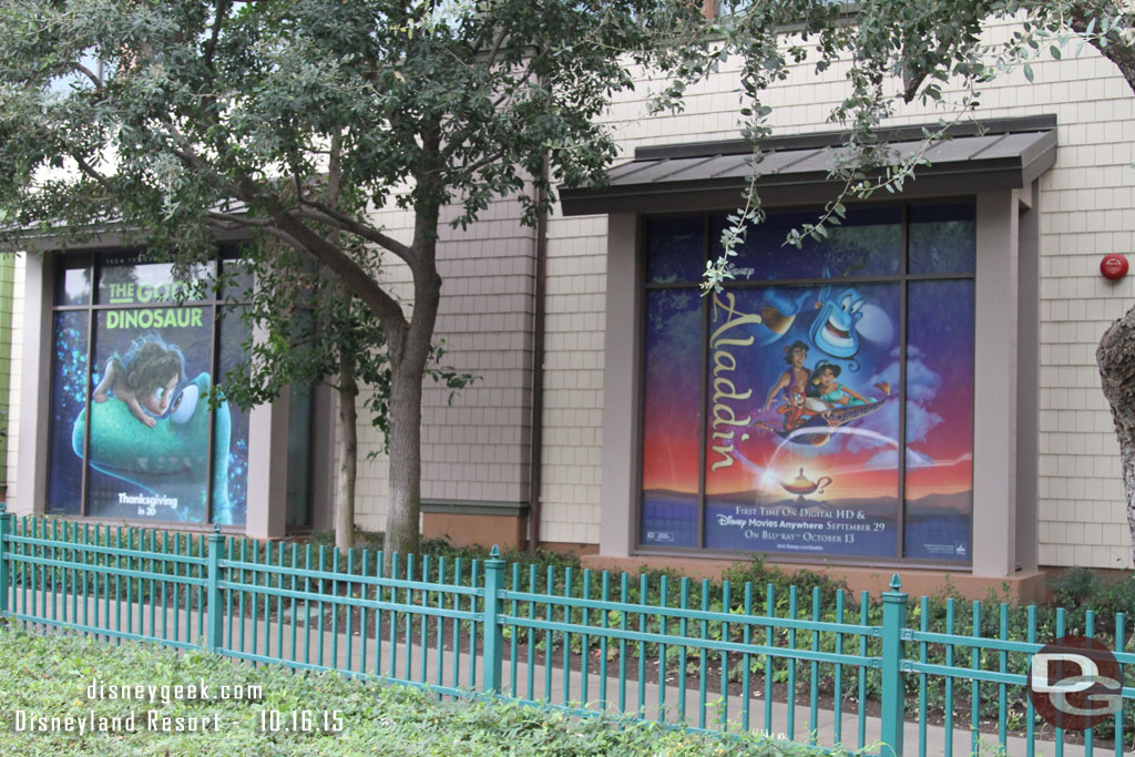 The windows at the tram stop now advertise Aladdin on Home Video and the Good Dinosaur coming to theaters in November.