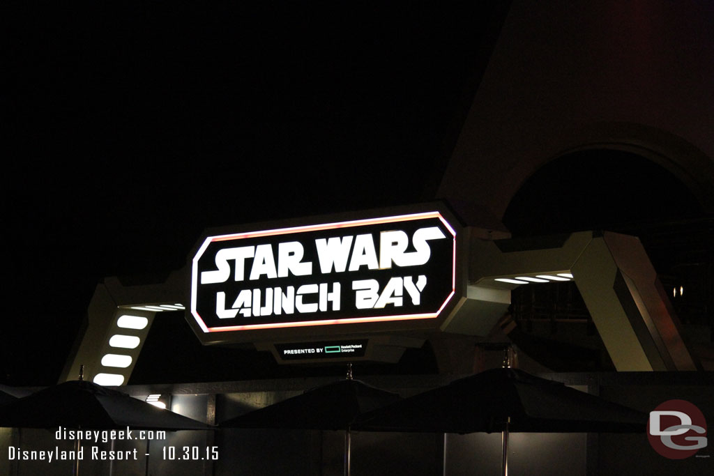 The Star Wars Launch Bay sign after dark.