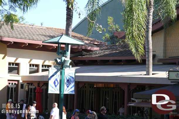 Downtown Disney has Disneyland 60th Banners up still.  Wonder if Christmas will be coming or if they will stay 60th.