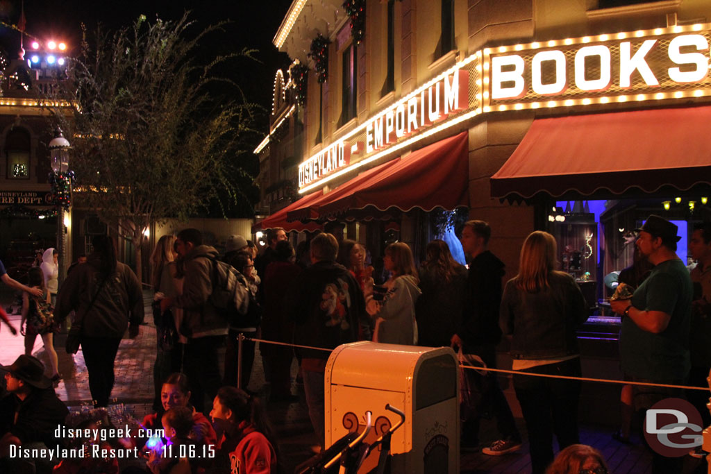 Guests gathered around the new Frozen window.