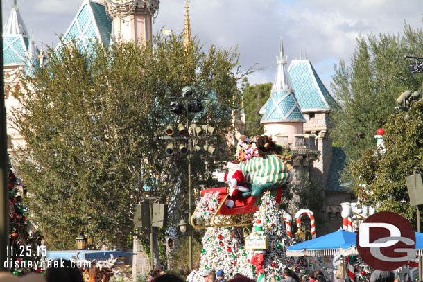 Then I continued down the sidewalk.  Santa passing by the castle.