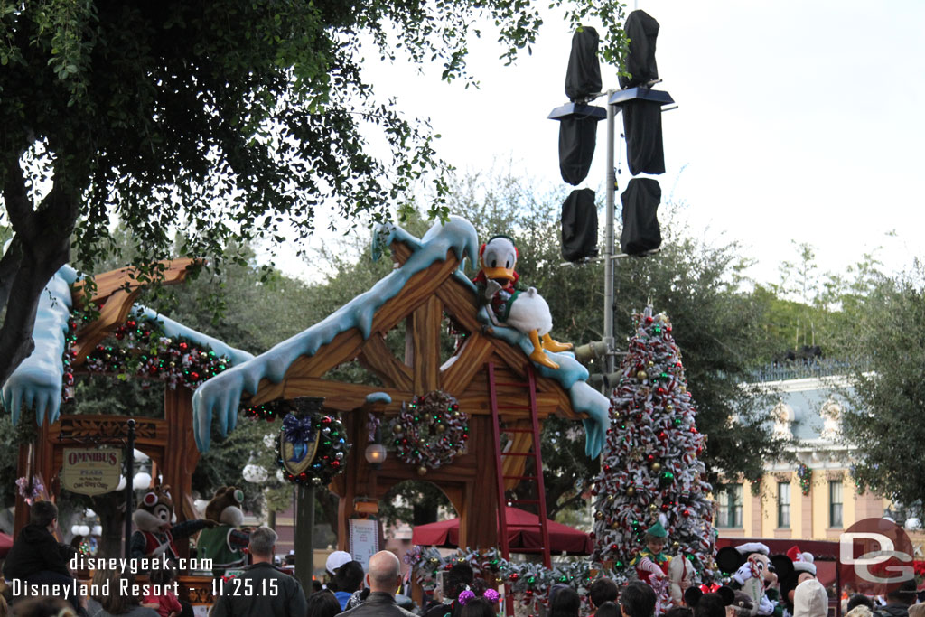 Arrived in Town Square the same time as a Christmas Fantasy Parade.  Also notice the lights for the Candlelight are up.