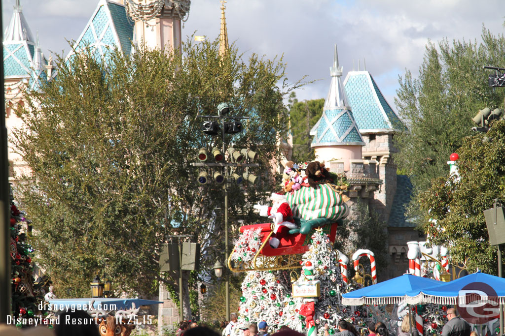 Then I continued down the sidewalk.  Santa passing by the castle.