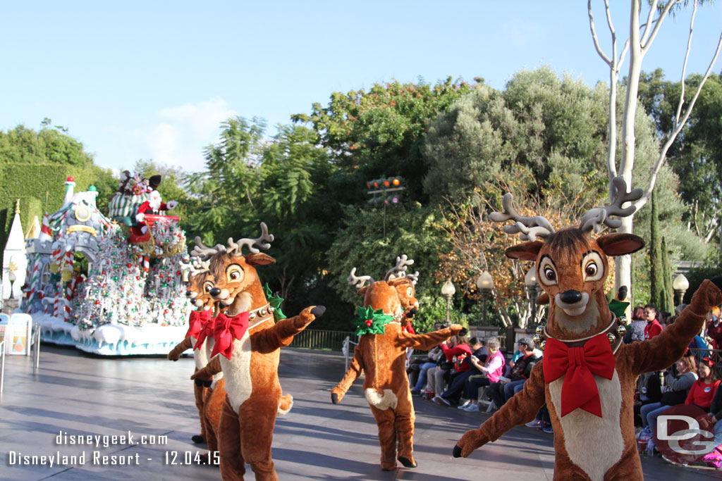 While in line for Small World Santa passed by to conclude a Christmas Fantasy.