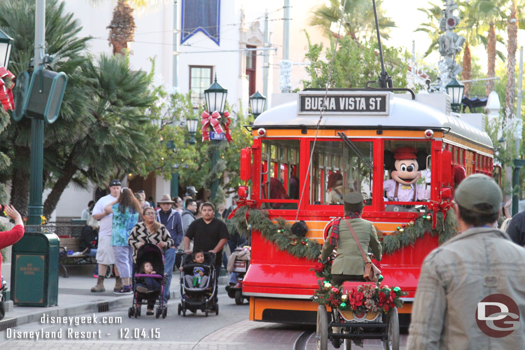 The Red Car traveling through the park.