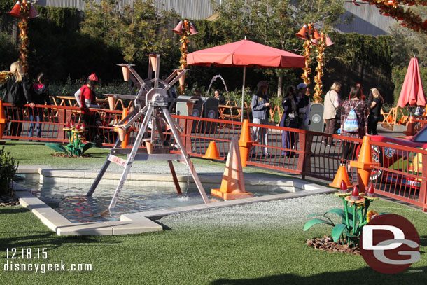 The Cozy Cone fountain was falling short again.  The discoloration by the chemicals in the water on the turf can pass for snow this time of year.