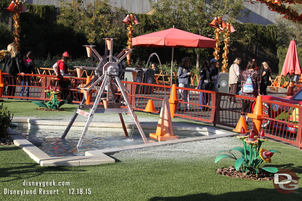 The Cozy Cone fountain was falling short again.  The discoloration by the chemicals in the water on the turf can pass for snow this time of year.