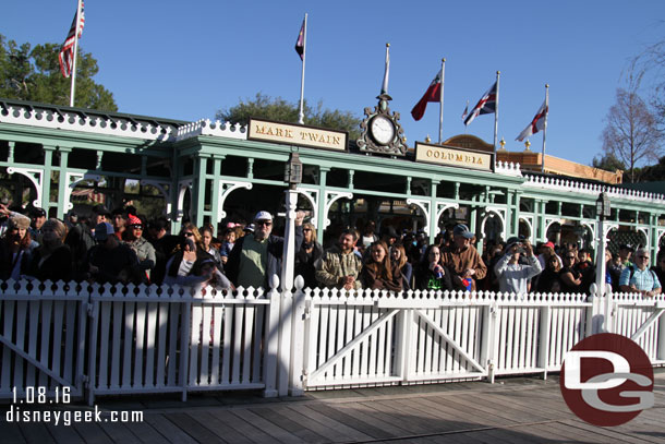 A large crowd waiting to board.