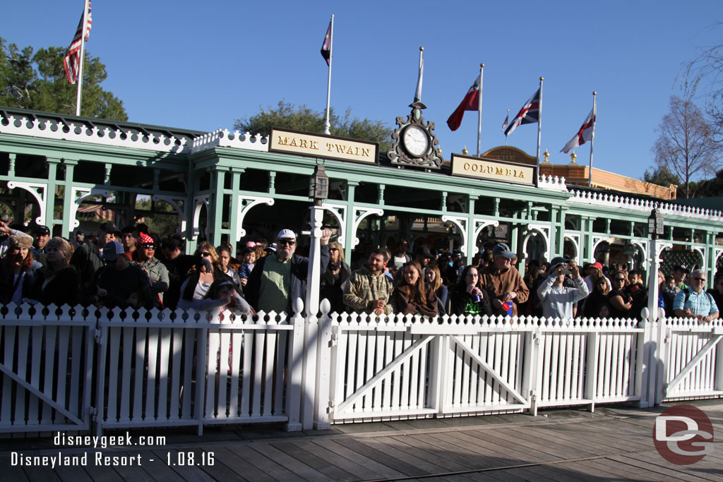 A large crowd waiting to board.