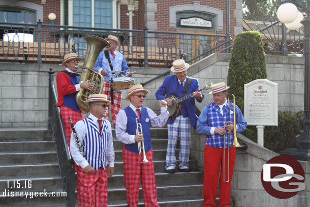 The Straw Hatters at the Train Station.