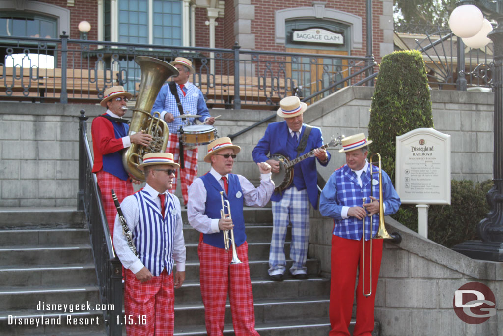 The Straw Hatters at the Train Station.